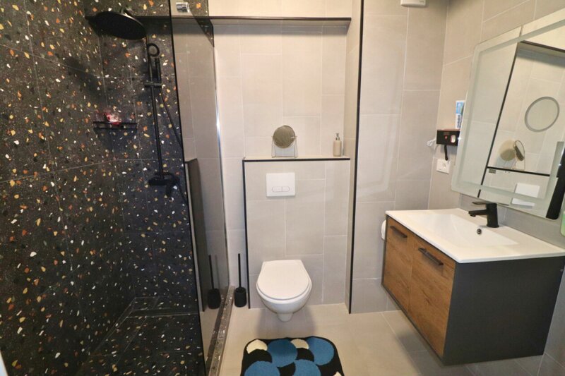 Titan Bloc finalizat 2025 situat langa Auchan Titan - se adauga TVA